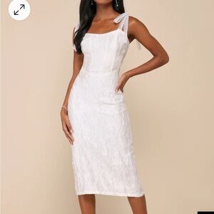 NEVER WORN WITH TAGS